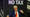 Donald Trump dances in front of a sign that says "NO TAX."